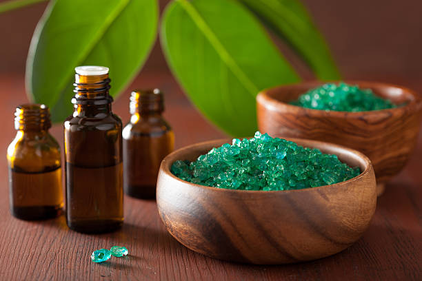 Green herbal salt and essential oils for healthy spa bath