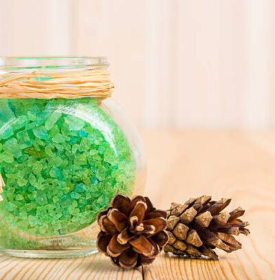 Sea salt in the pot with an extract of siberian pine cones
