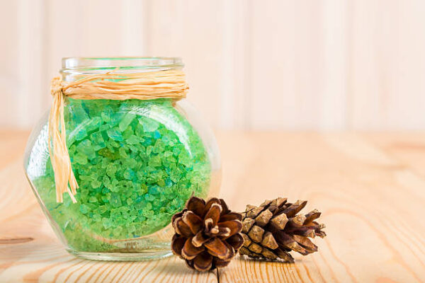 Sea salt in the pot with an extract of siberian pine cones